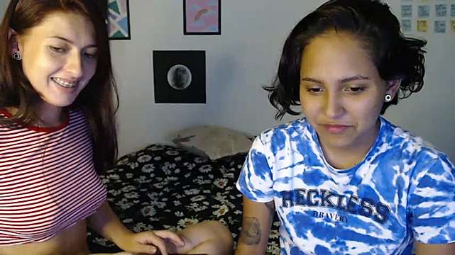 SaraAndYuli naked stripping on cam for live sex video chat