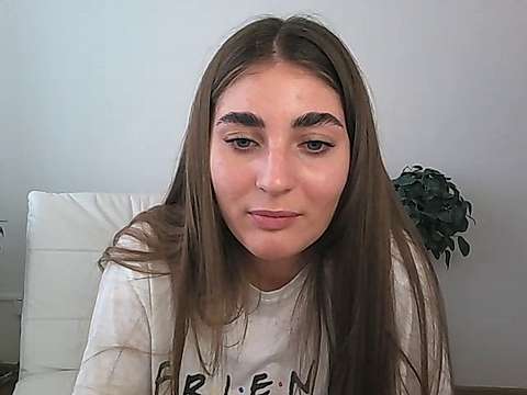Emi-Ly naked stripping on cam for live sex video chat